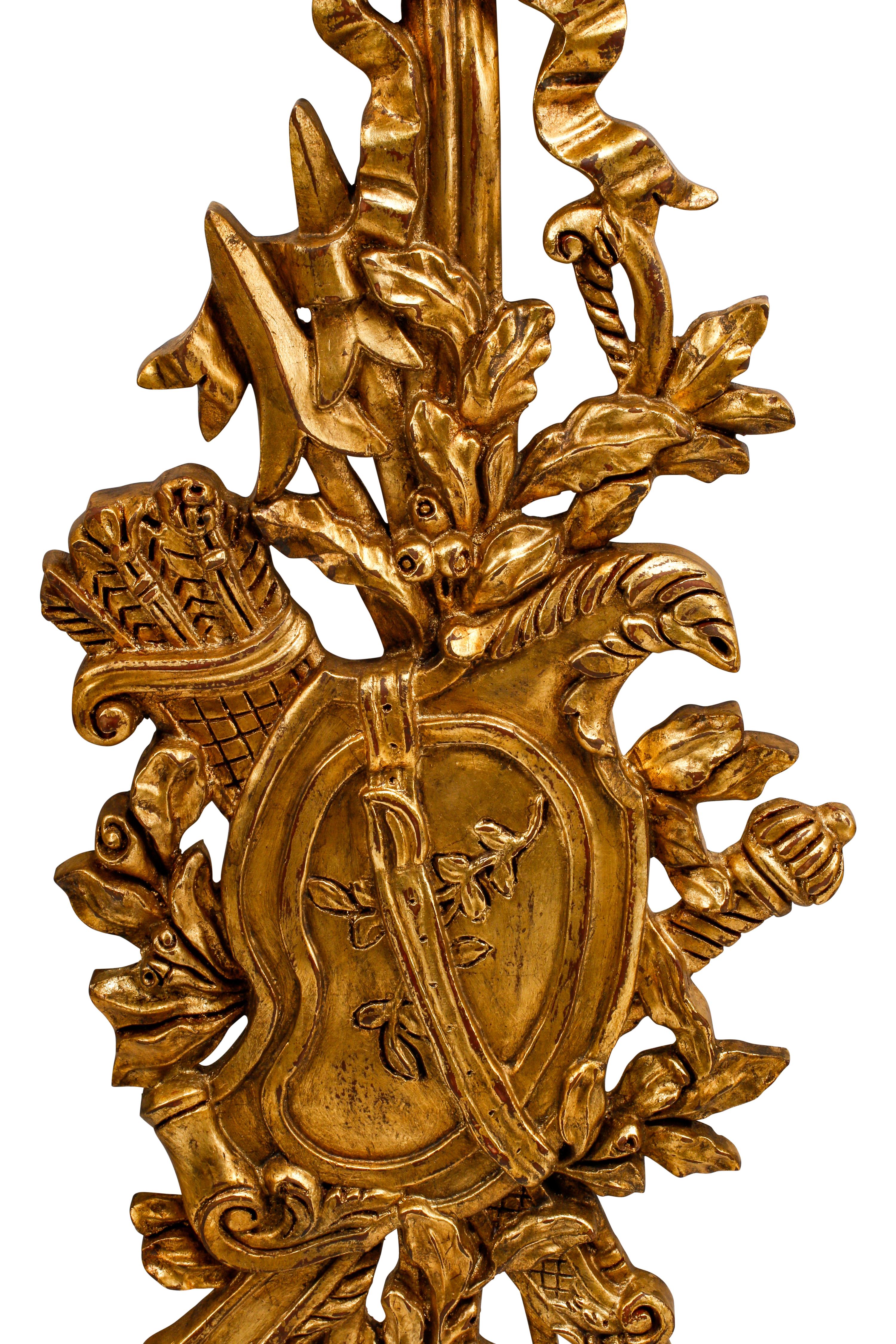 A Set of Four Louis XV Style Giltwood Trophy Plaques
