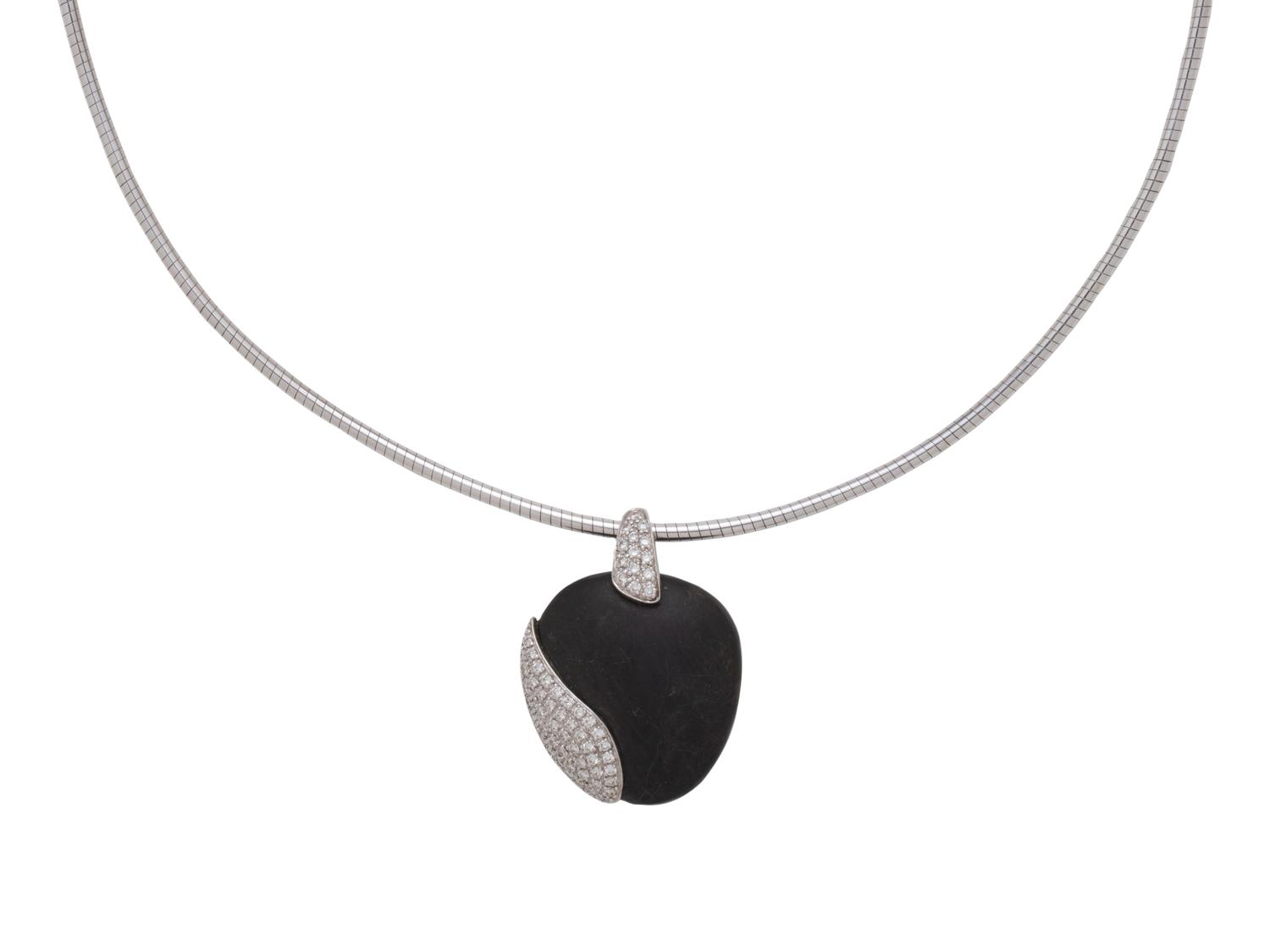 MOVADO, WHITE GOLD, PEBBLE AND DIAMOND SET