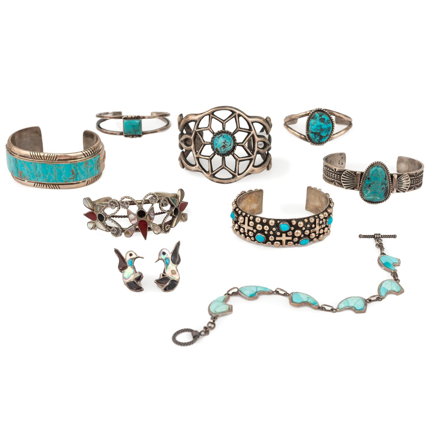 Selection of Navajo, Hopi, and Zuni Silver Bracelets and Earrings, with Inlay