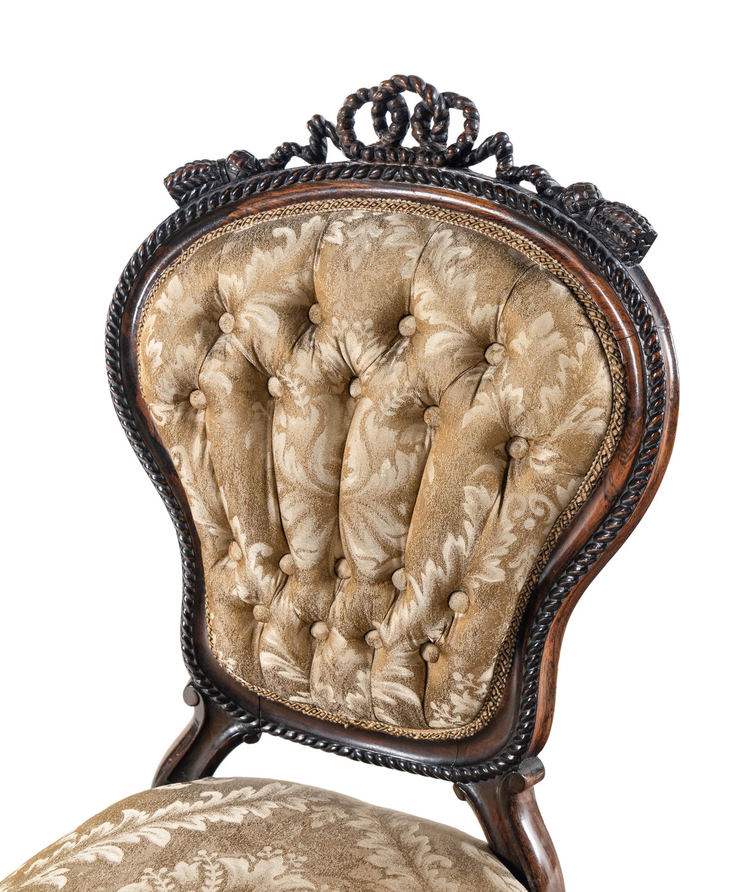A Set of Four Rococo Revival Carved Balloon-Back Side Chairs