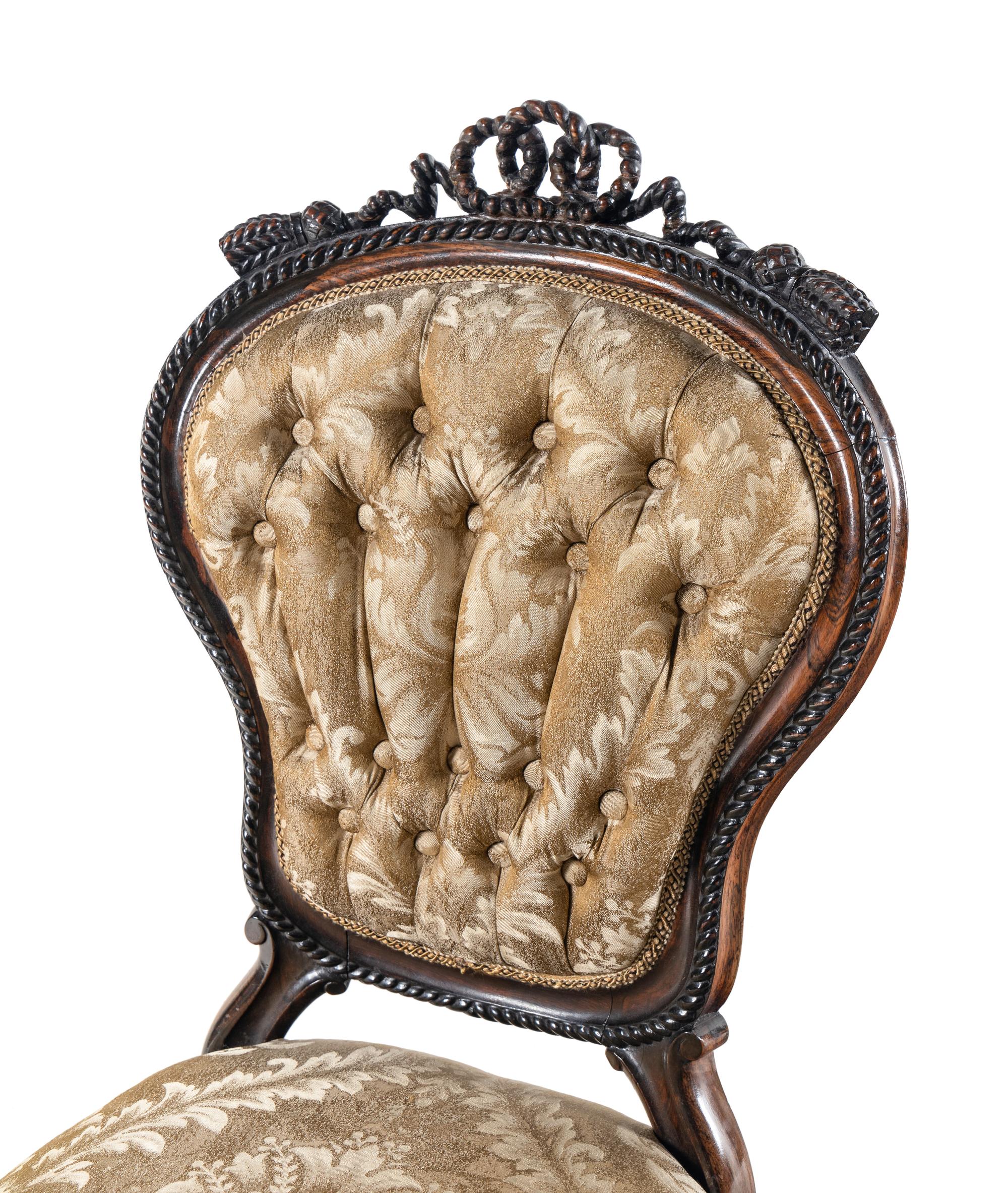 A Set of Four Rococo Revival Carved Balloon-Back Side Chairs