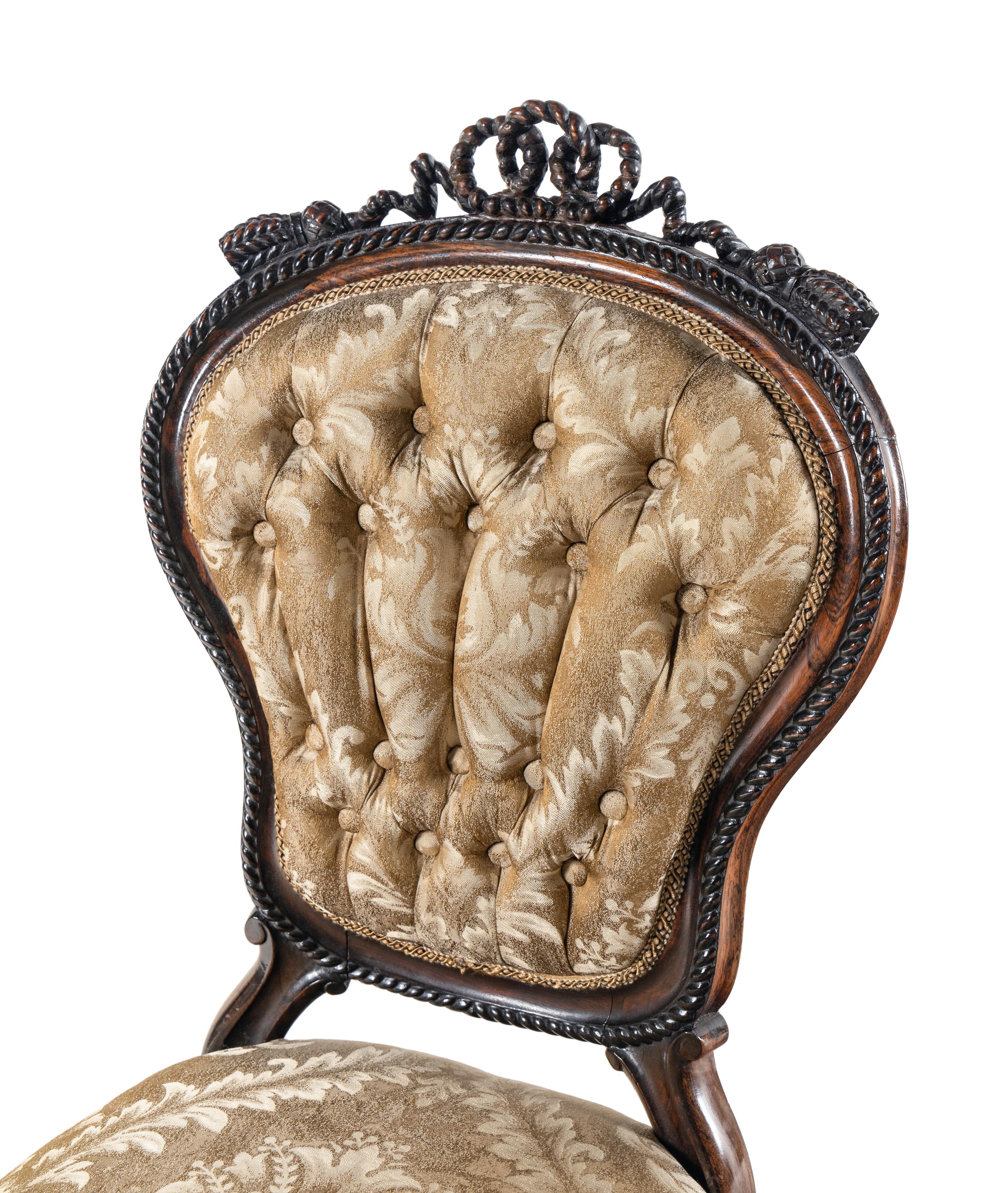 A Set of Four Rococo Revival Carved Balloon-Back Side Chairs