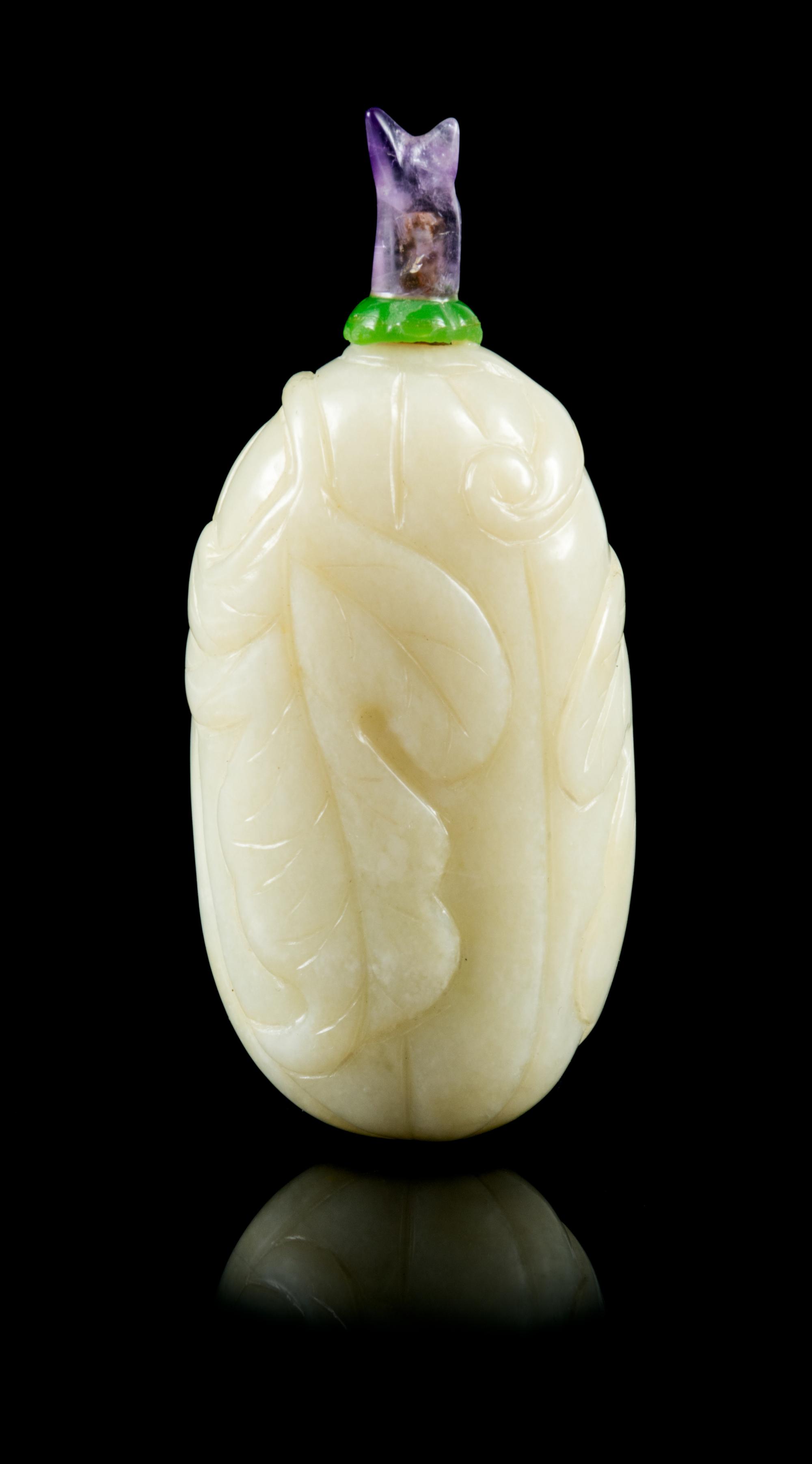 A Mottled White Jade Snuff Bottle Height 3 1/4 inches. — 19TH CENTURY