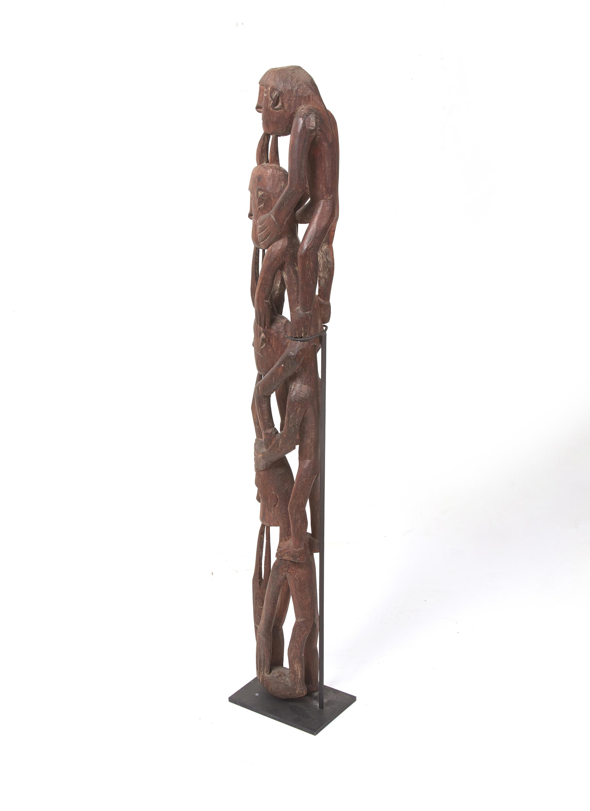 An Asmat Figure COMBINED WITH 31