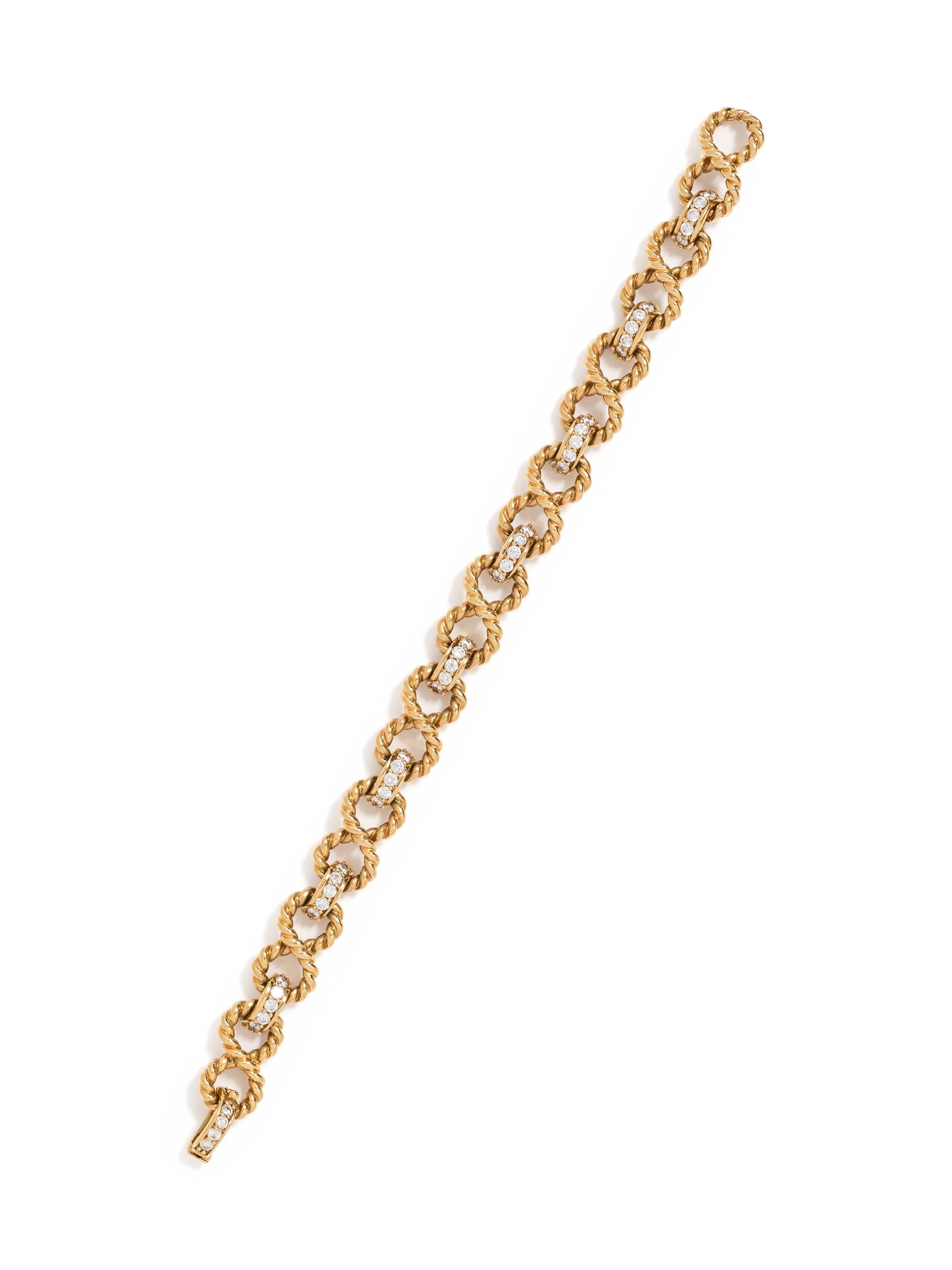 TIFFANY & CO., YELLOW GOLD AND DIAMOND 'INFINITY' BRACELET