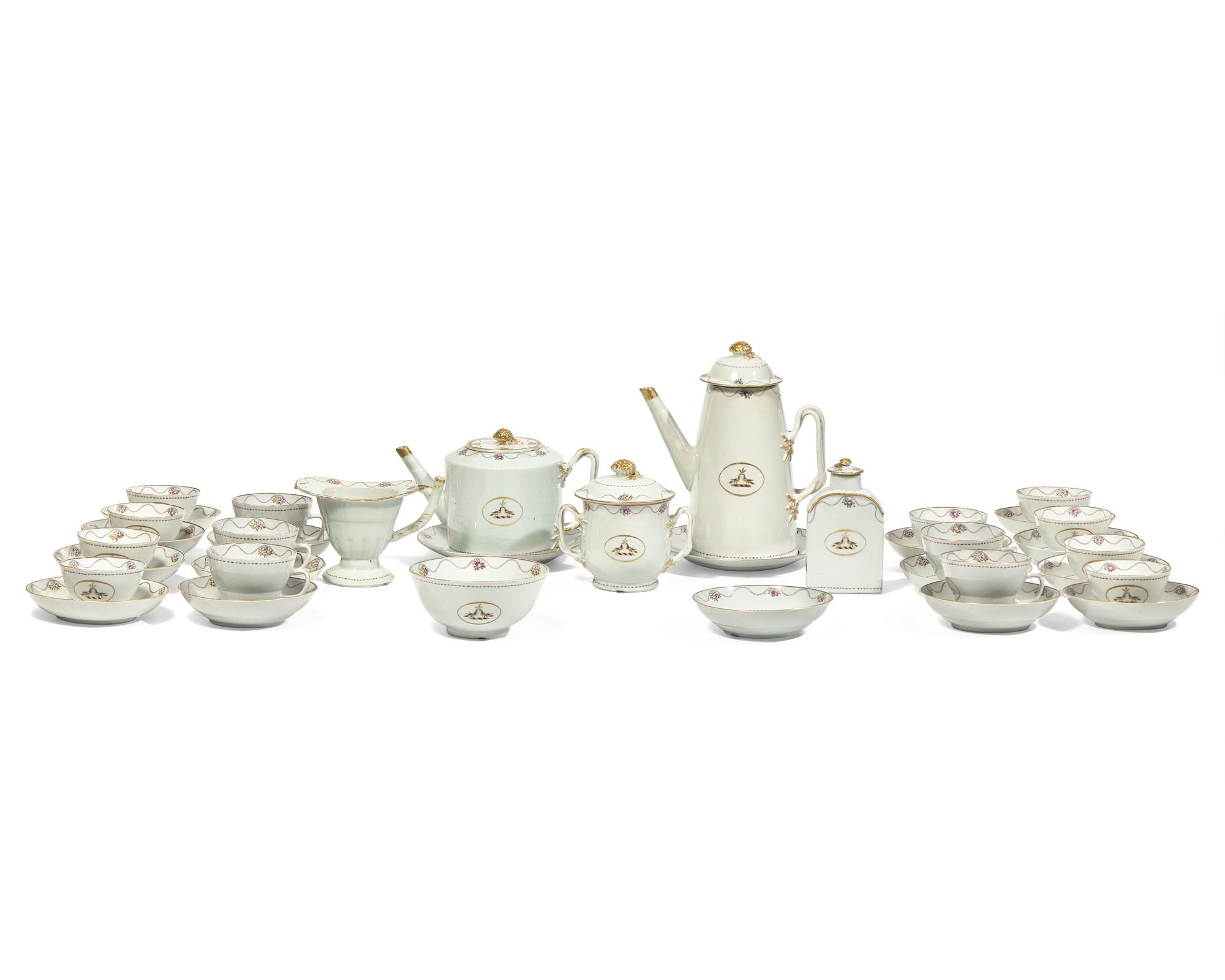 A Chinese Export Famille Rose Parcel-Gilt and Polychrome Armorial Porcelain Tea and Coffee Service