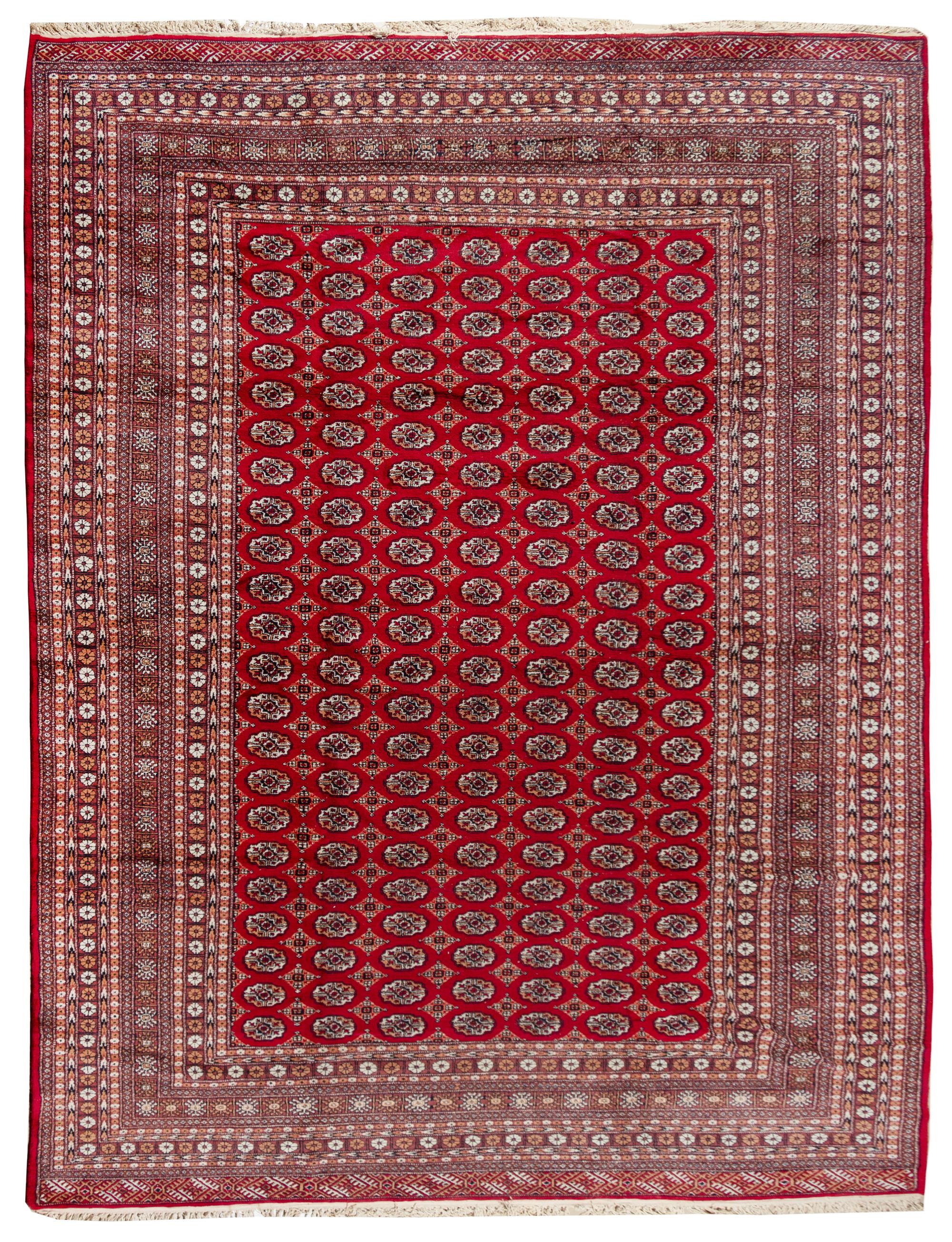 A Bokhara Wool Rug 13 feet 10 inches x 10 feet. — 20TH CENTURY