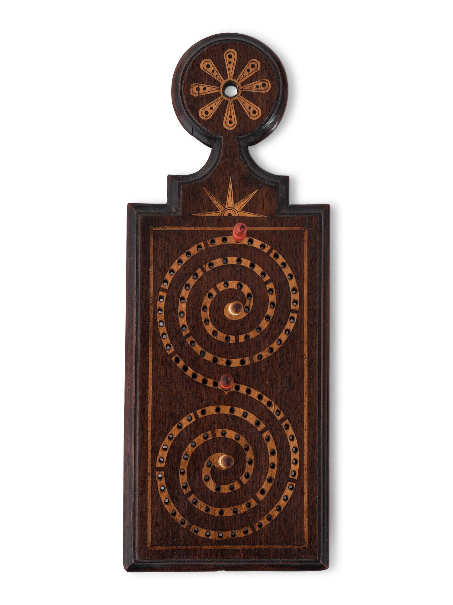 Two Carved Wood Game Elements