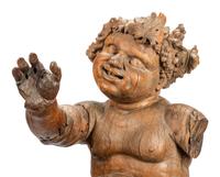 An Italian Carved Wood Figure of Bacchus on a Later Associated Faux Marble Pedestal