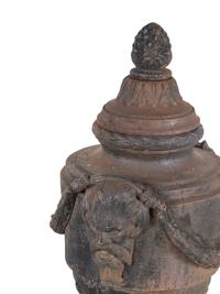 A Pair of Cast Iron Covered Garden Urns