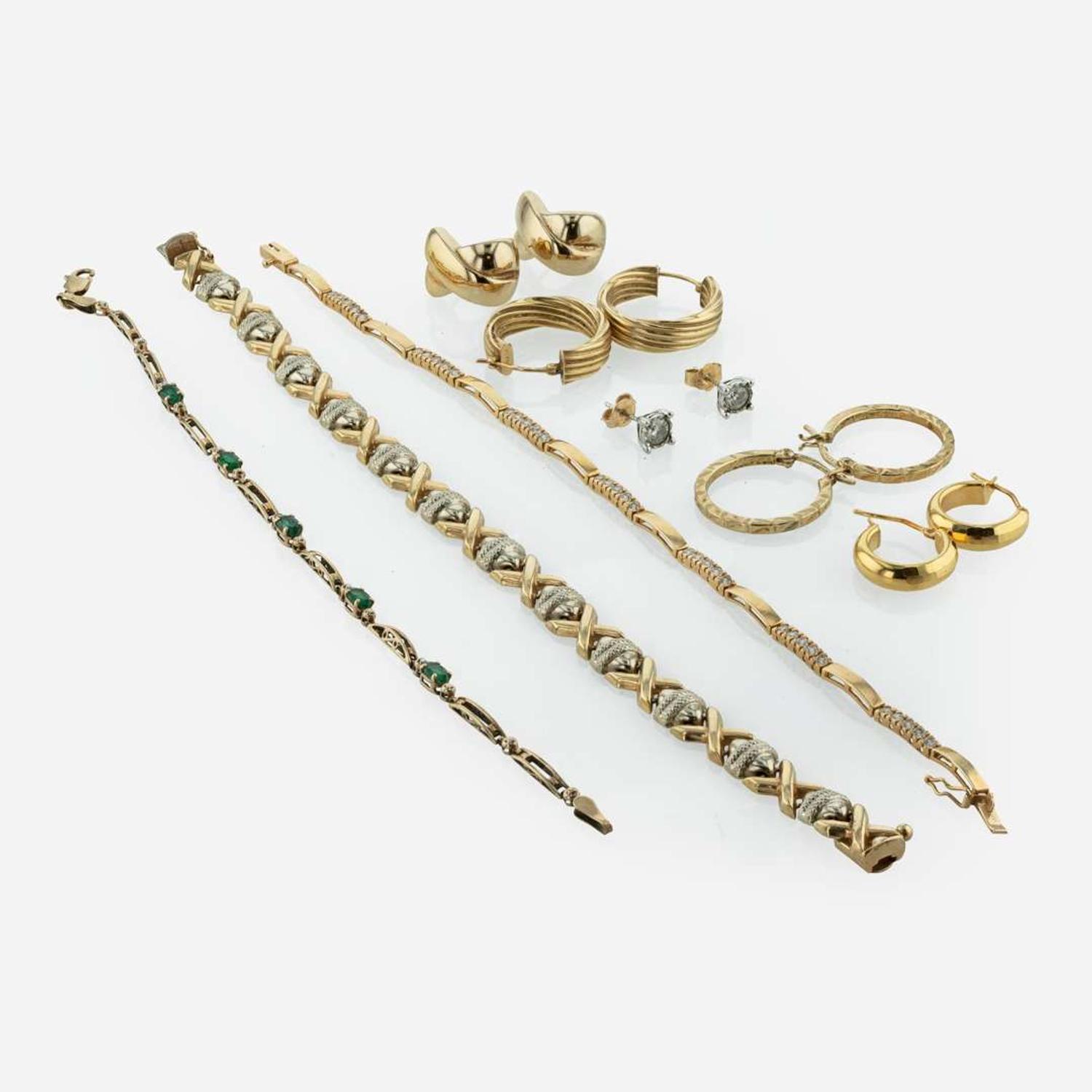 A Collection of Assorted Gold Bracelets and Earrings
