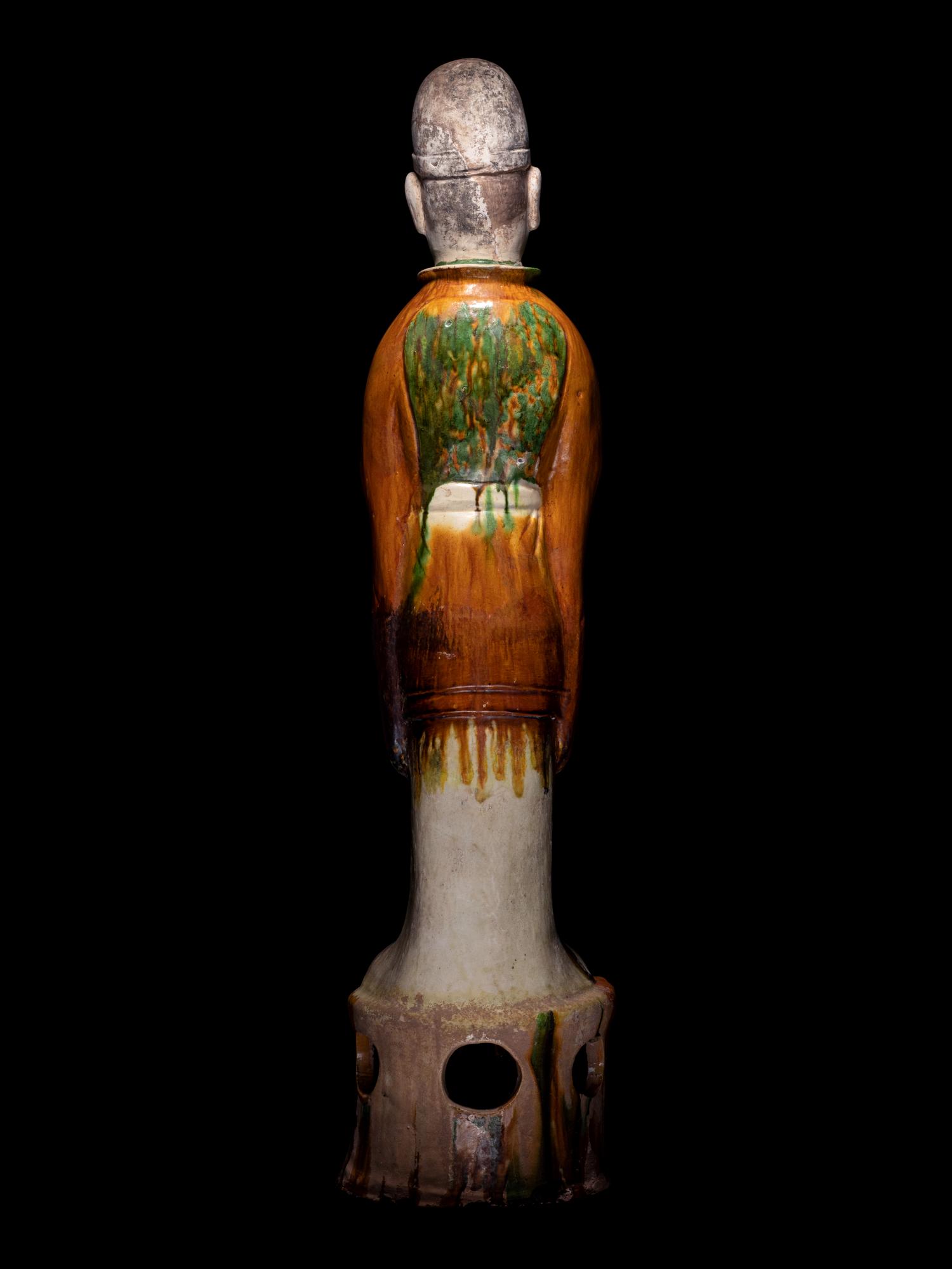 A Pair of Sancai Glazed Pottery Figures of Standing Officials