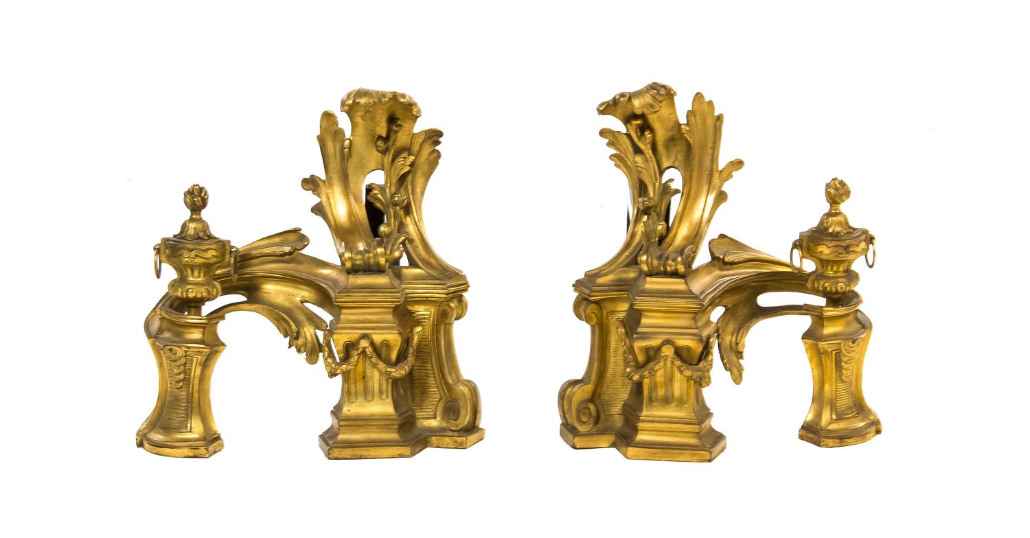 A Pair of Louis XV Style Gilt Bronze Chenets, Bagues, Height 12 1/2 inches.