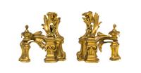 A Pair of Louis XV Style Gilt Bronze Chenets, Bagues, Height 12 1/2 inches.