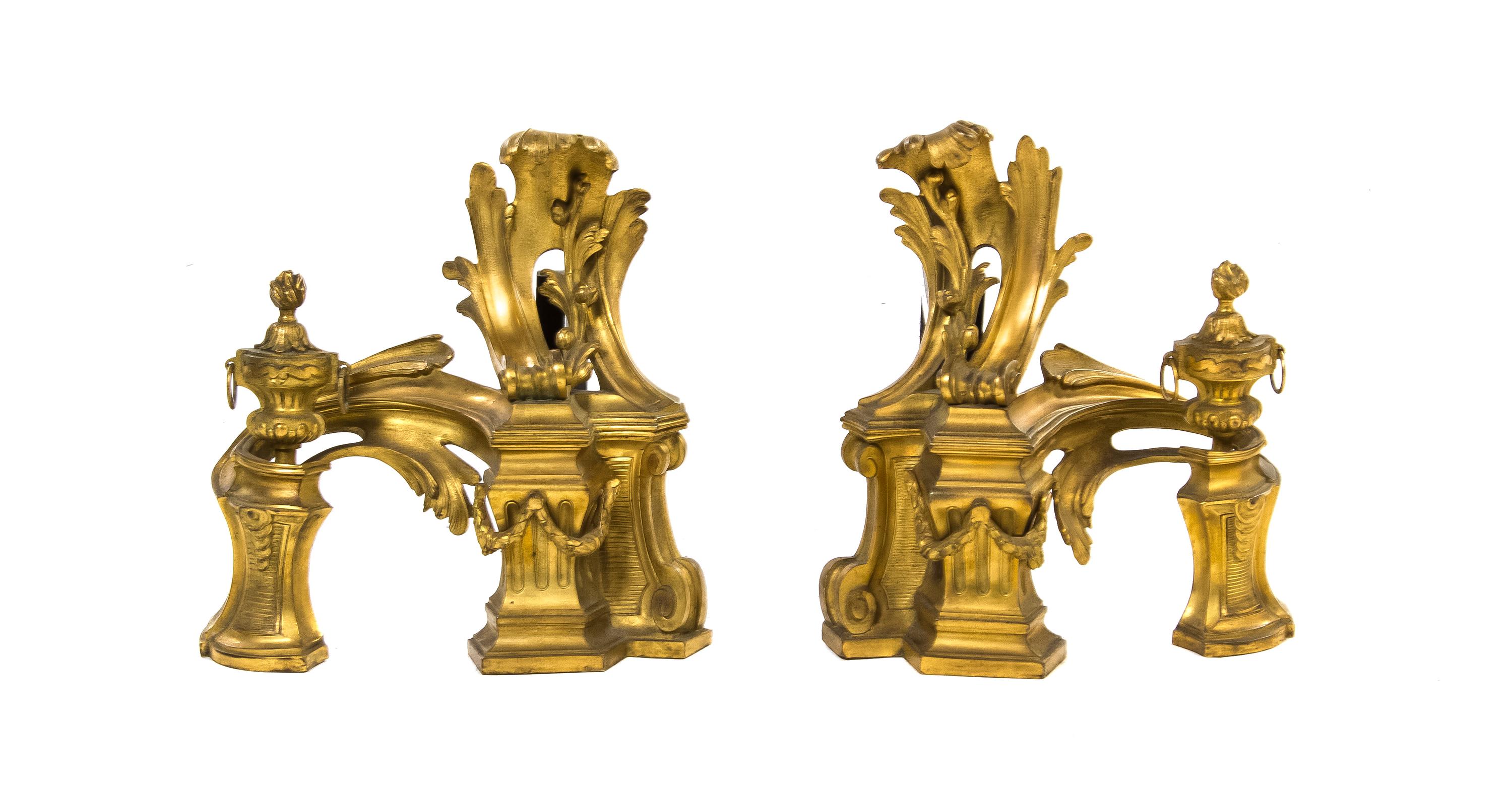 A Pair of Louis XV Style Gilt Bronze Chenets, Bagues, Height 12 1/2 inches.