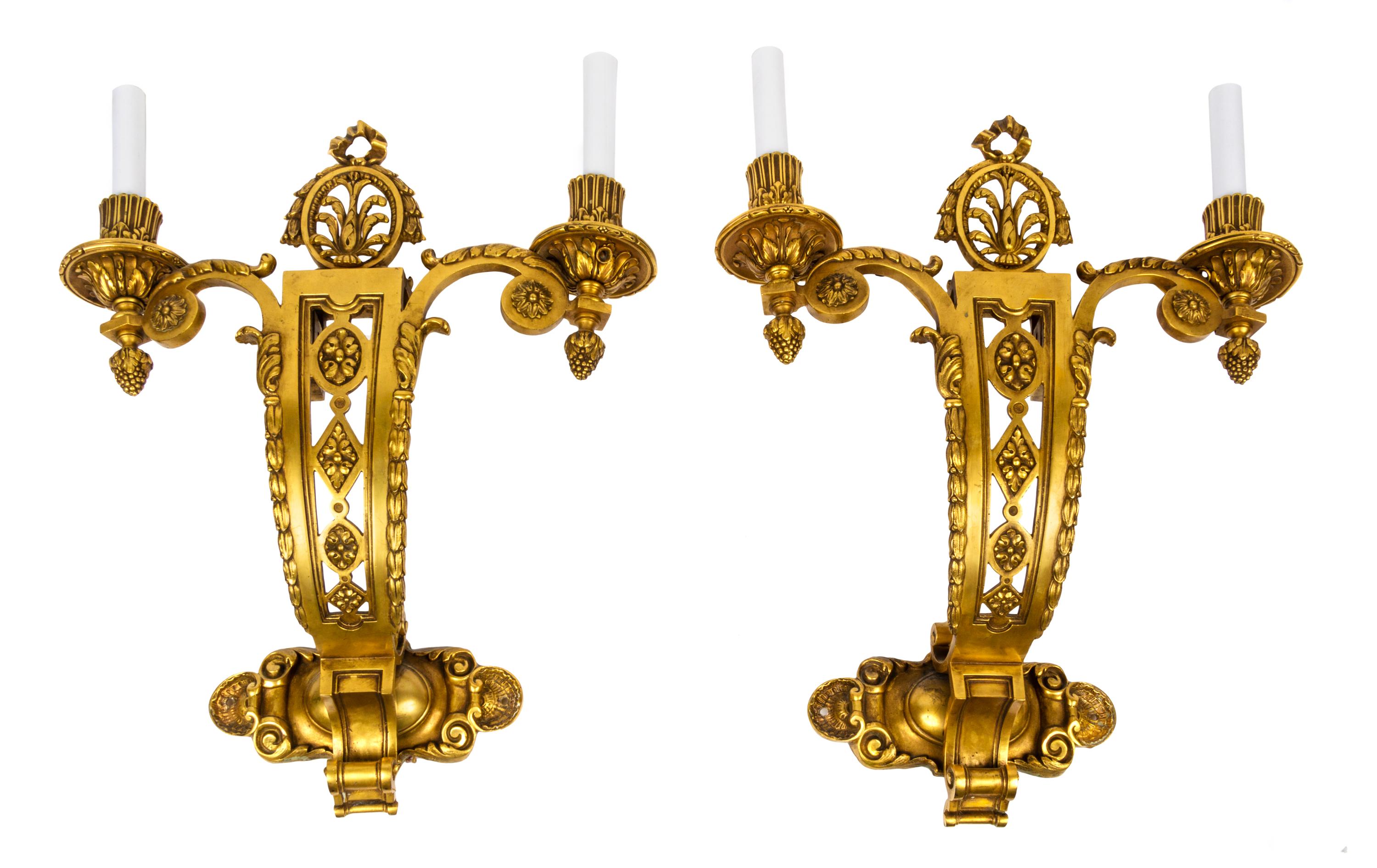 A Pair of Neoclassical Gilt Bronze Two-Light Sconces Height 18 inches. — EARLY 20TH CENTURY