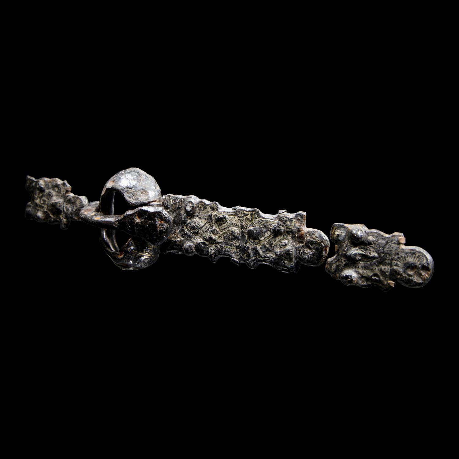 Five Migration Period Iron and Silver Belt Attachments