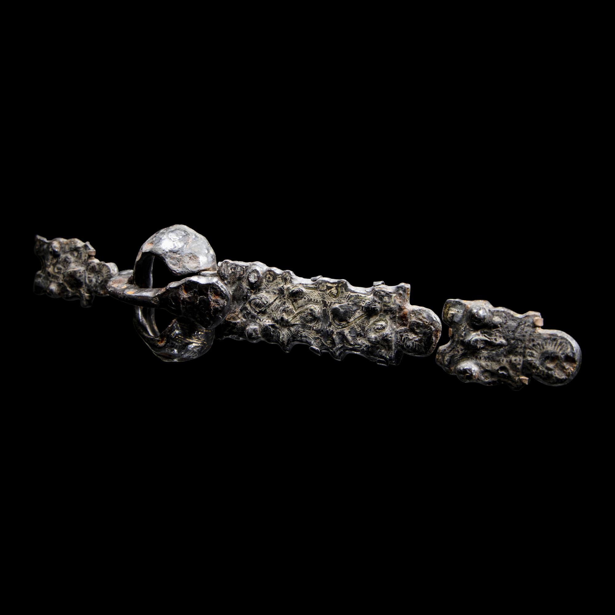 Five Migration Period Iron and Silver Belt Attachments