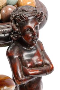 A Continental Carved Wood Jardinière and Fifteen Marble Ornaments