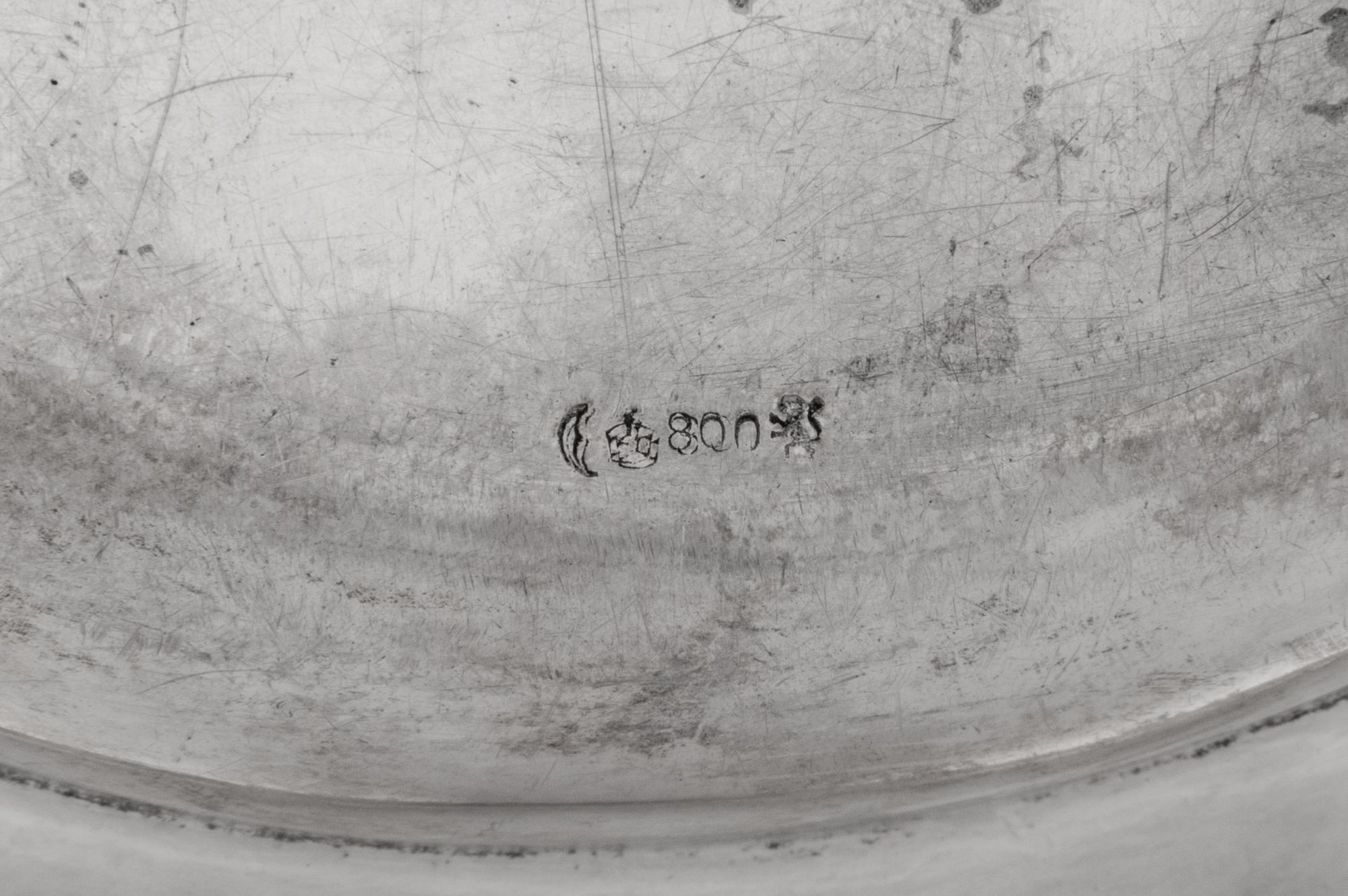 A Near Pair of German Silver Serving Platters