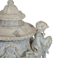 A Pair of Classical Style Cast Stone Covered Urns