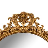 A French Giltwood and Composition Oval Mirror