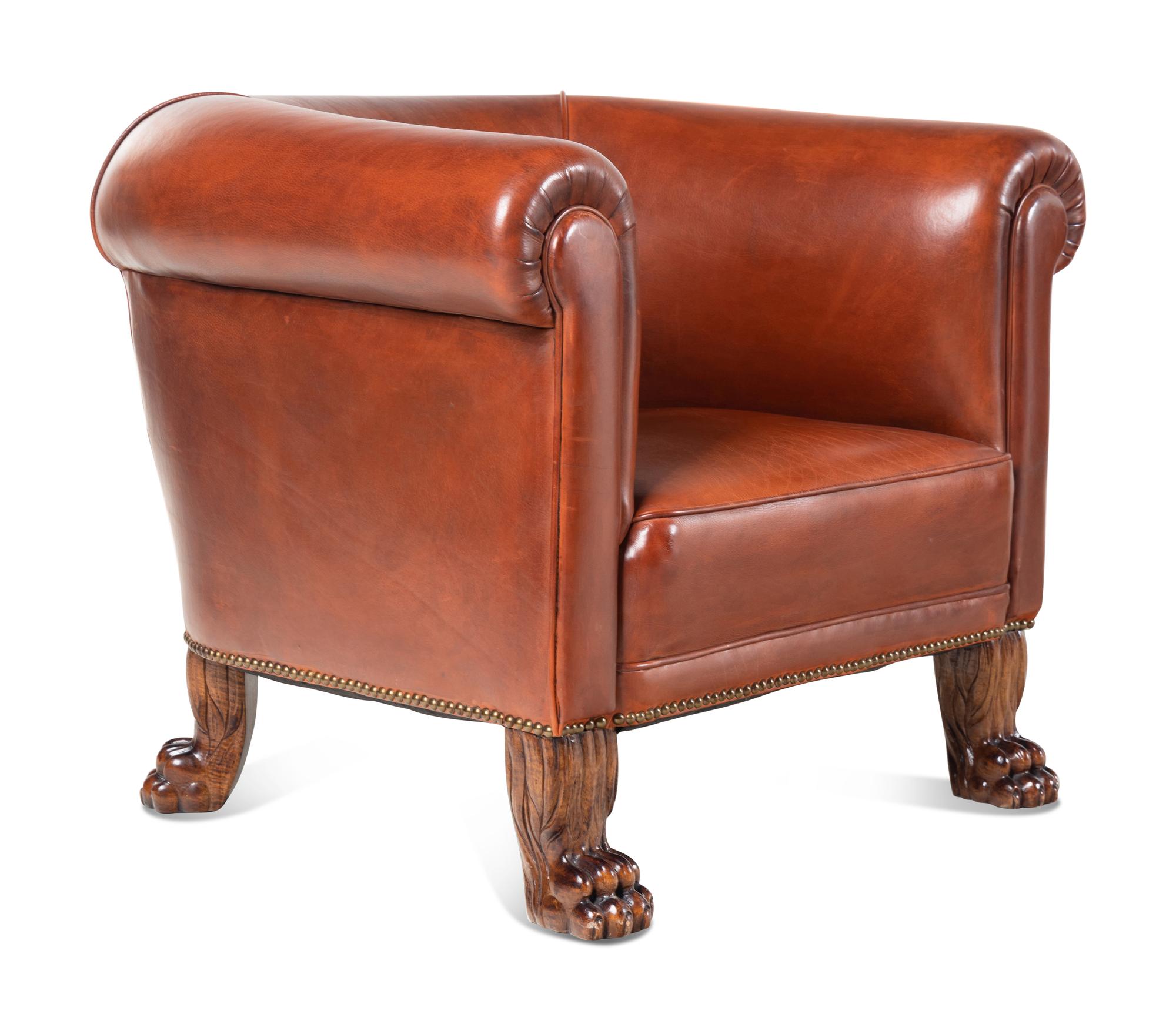 A Leather-Upholstered Mahogany Three-Piece Seating Suite