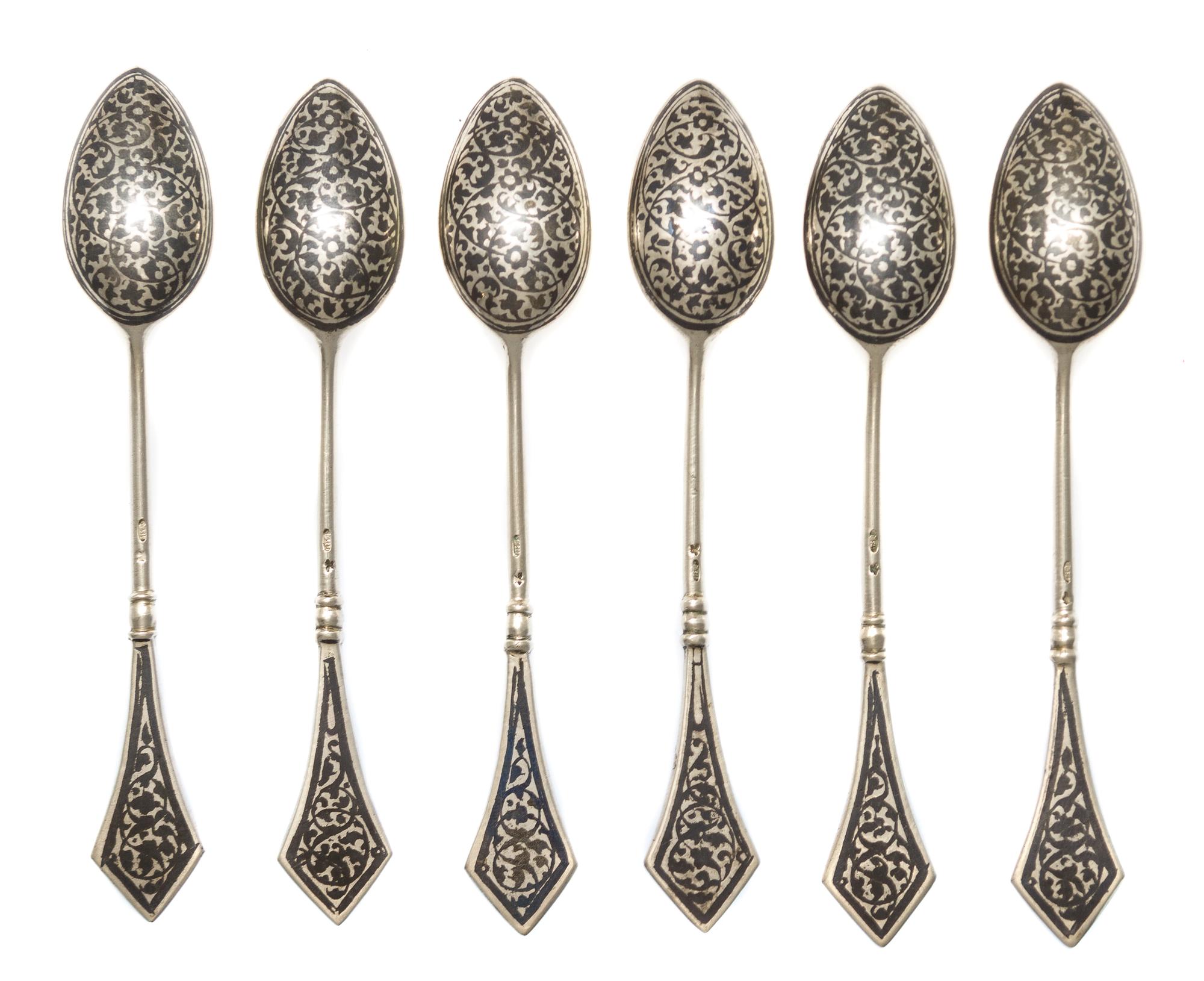 A Set of Six Russian Niello Silver Teaspoons, Maker's marks obscured, Moscow, late 19th/early 20th century, each having a knopped stem,