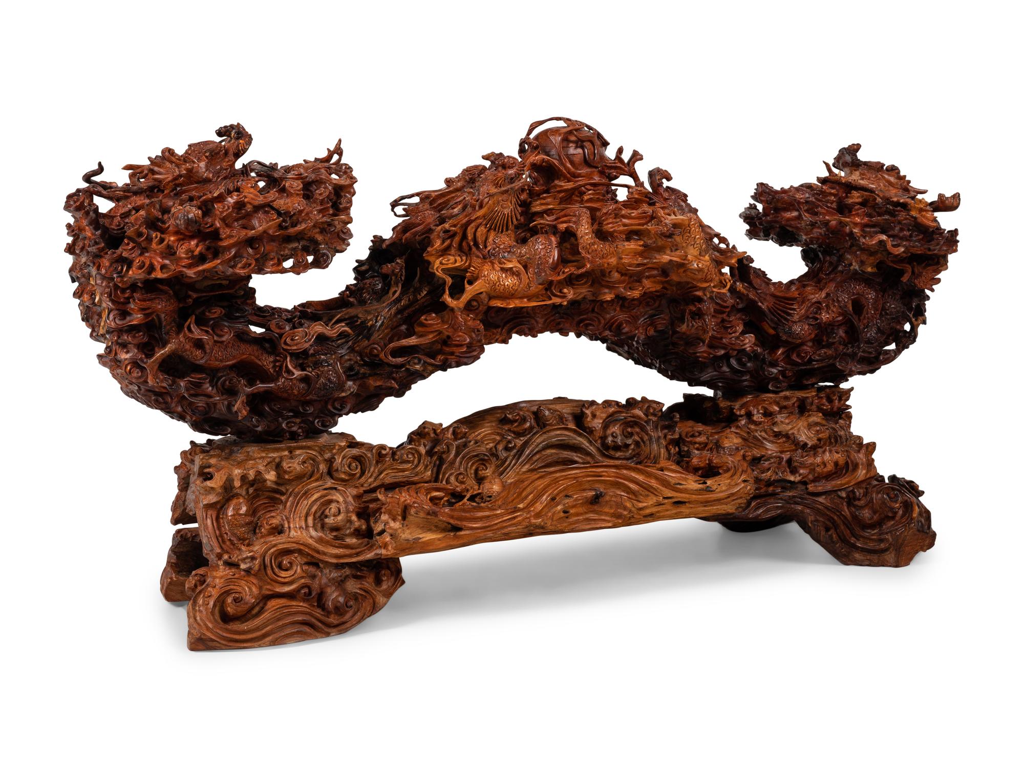 A Large Chinese Carved Rosewood or Mahogany Sculpture