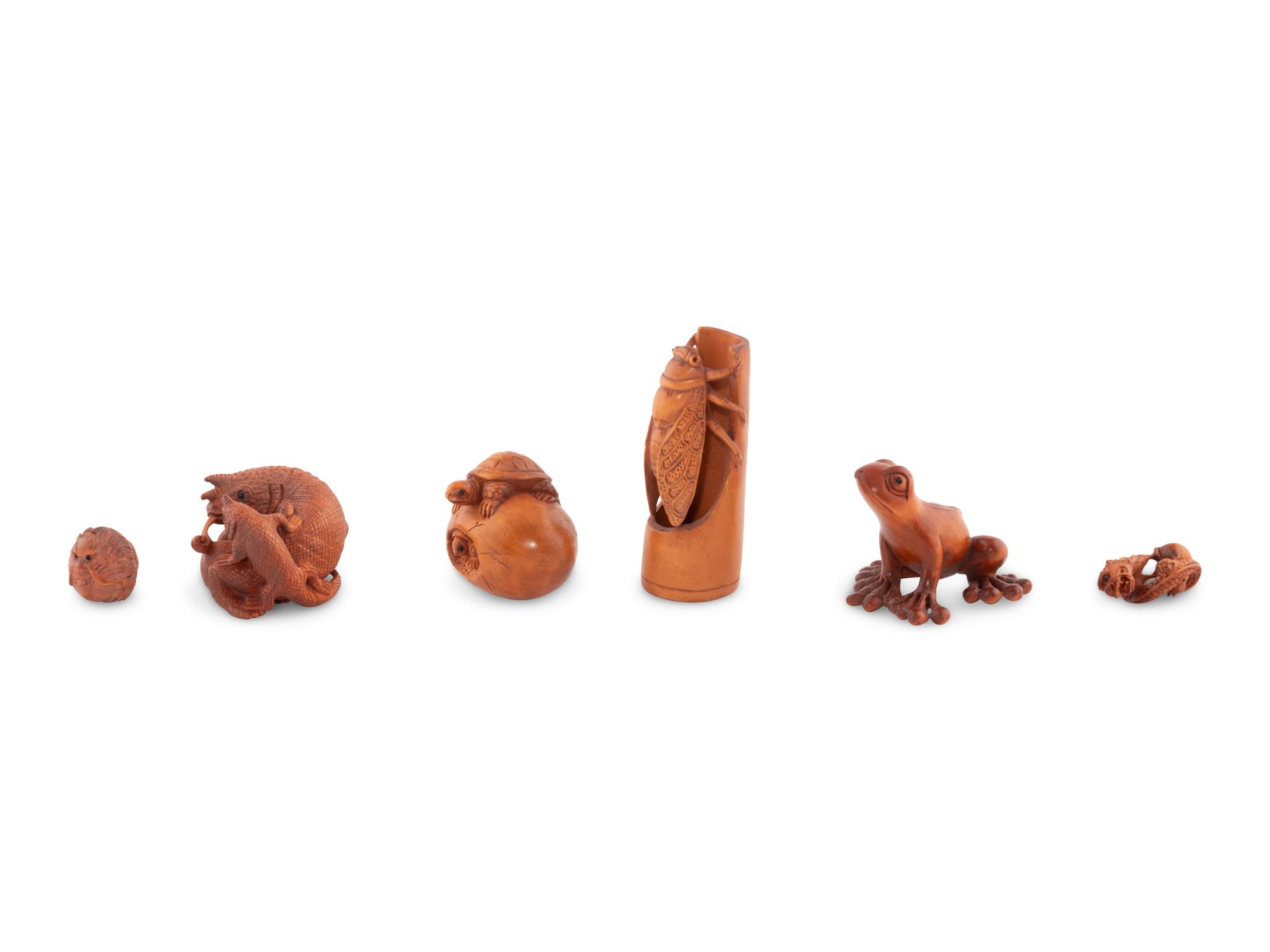 Four Japanese Boxwood Netsuke and Two Ojime