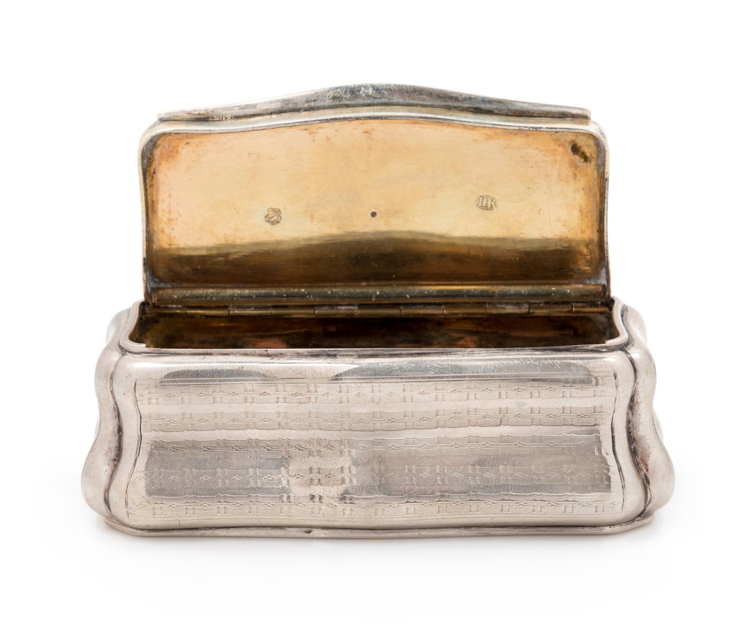 An Austrian Silver Snuff Box, Maker's Mark Obscured, Vienna, Late 19th/Early 20th Century, of rectangular bombe form with engine-turned