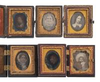 [EARLY PHOTOGRAPHY]. 74 sixteenth plate daguerreotypes of men, women, & children of varying ages.