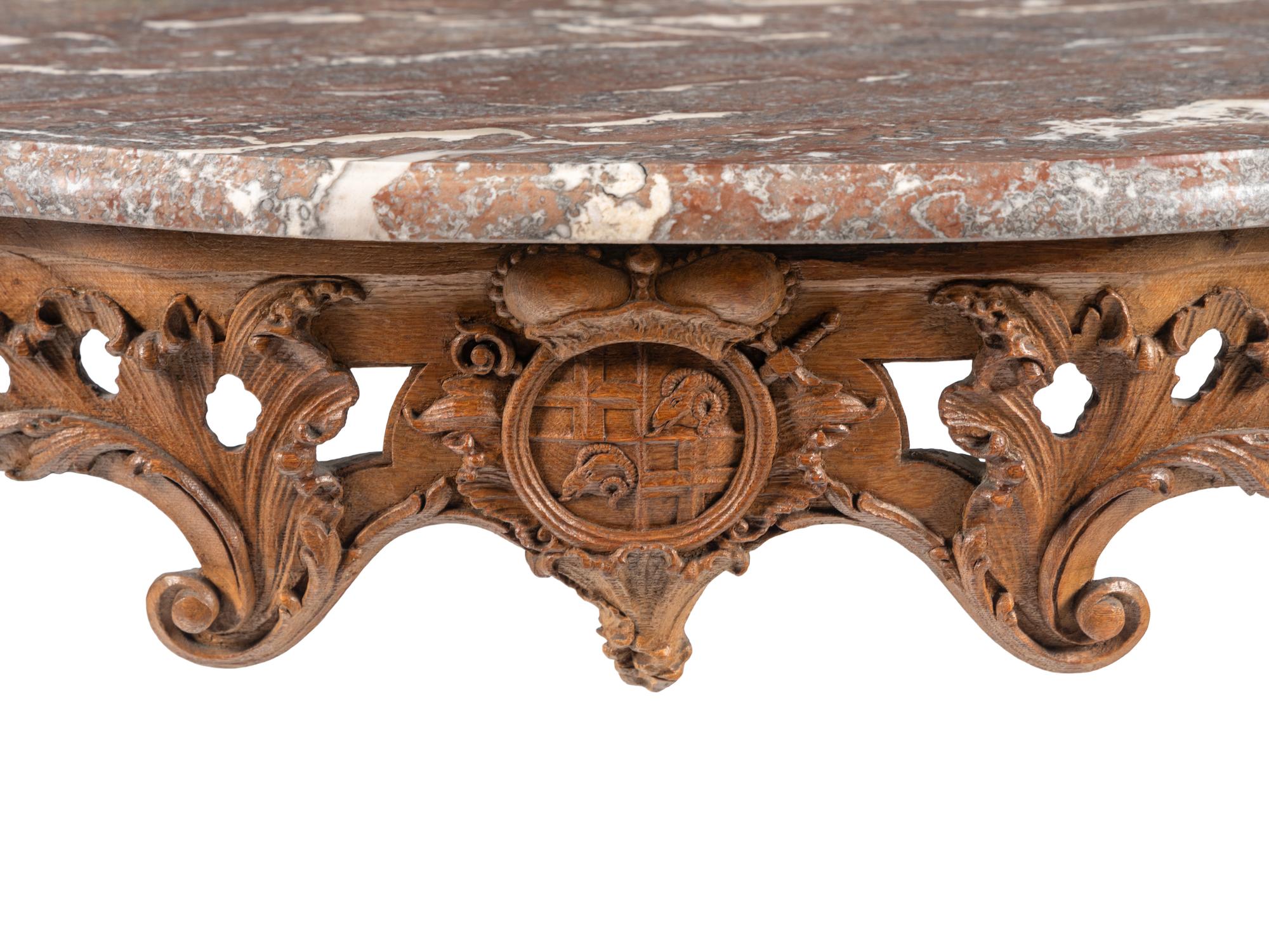 A Pair of Régence Carved Oak Marble-Top Console Tables