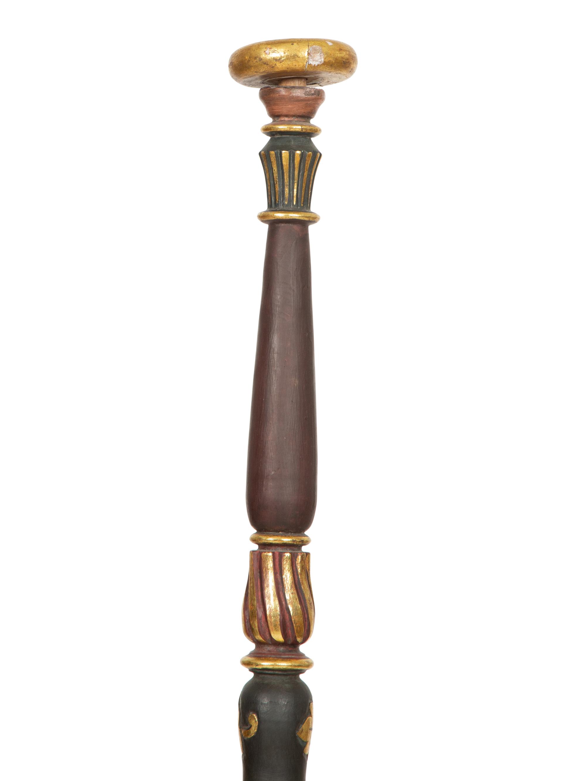 A Pair of Neoclassical Style Black and Gilt Torcheres