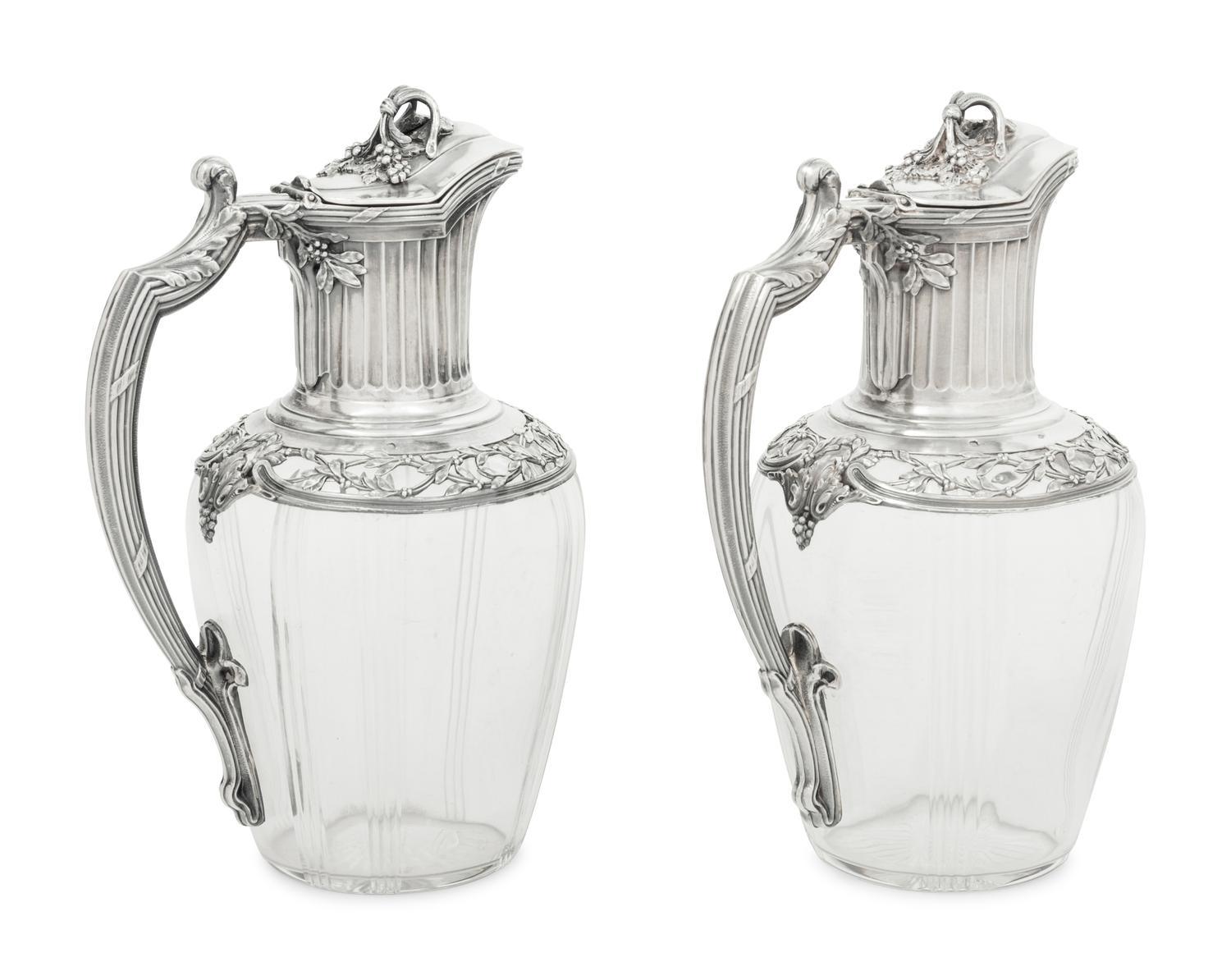 A Pair of French Silver and Glass Claret Jugs