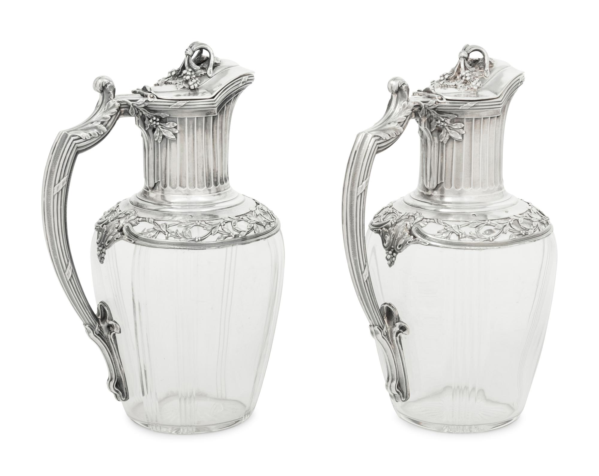 A Pair of French Silver and Glass Claret Jugs