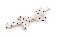 An Hermès Cream Bow Tie, Collar size: 30"- 46".