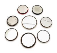 A Collection of Eight Celluloid Advertising Pocket Mirrors