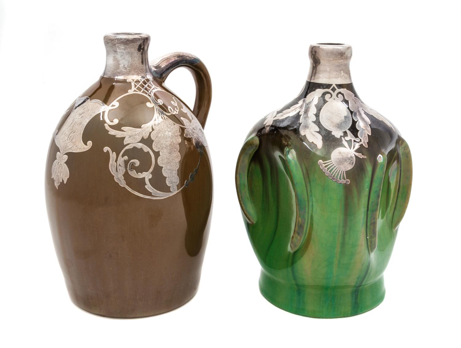 Two Musical Ceramic Silver Overlay Jugs Height of taller 8 7/8 inches.