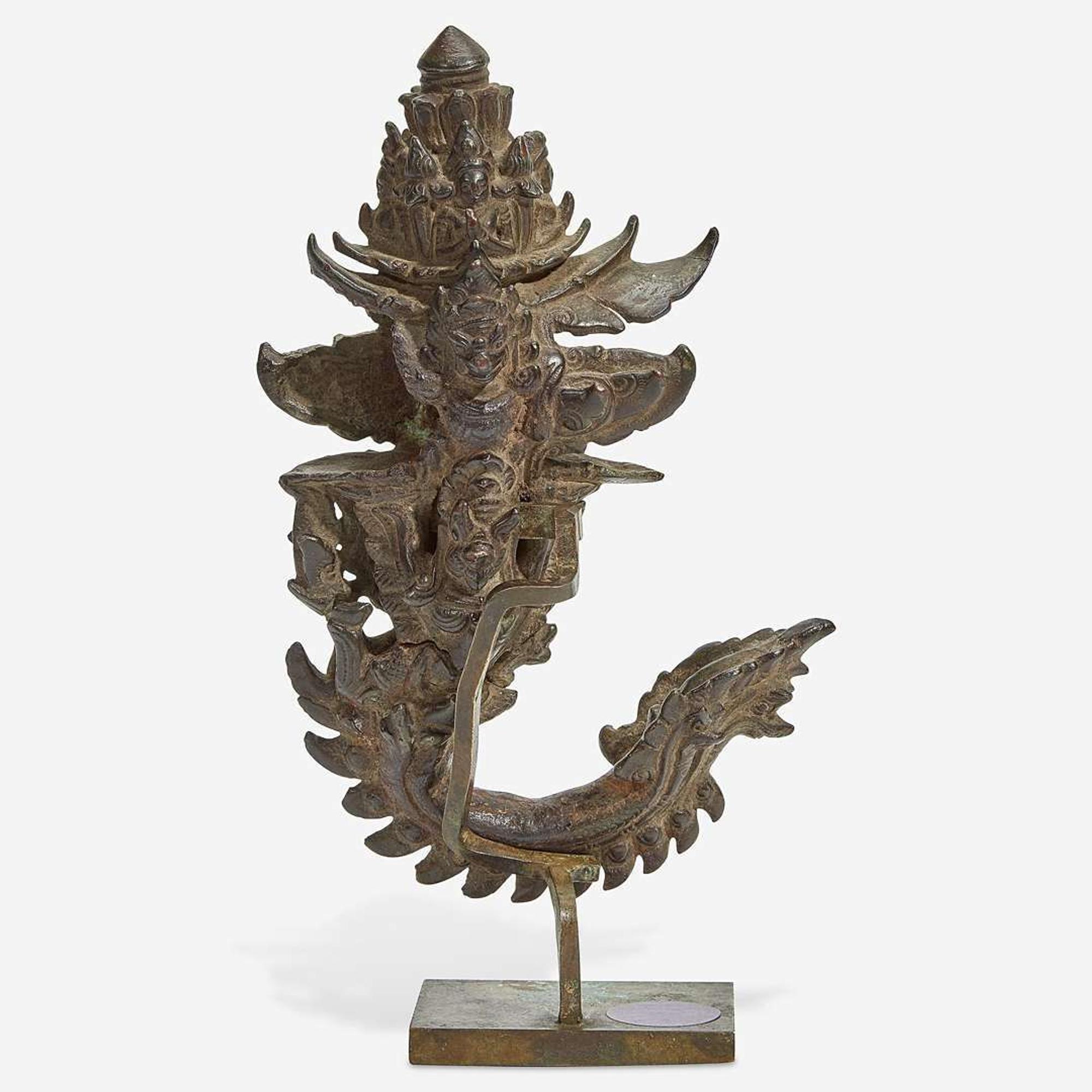 A Khmer bronze palanquin hook with later stand The hook 12th/13th Century