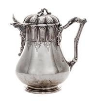 An American Silver Milk Jug, Tiffany & Co., New York, NY, Late 19th Century, of baluster form with leaf cast finial and branch form han