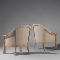 Pair of arm chairs after Pierre Chareau