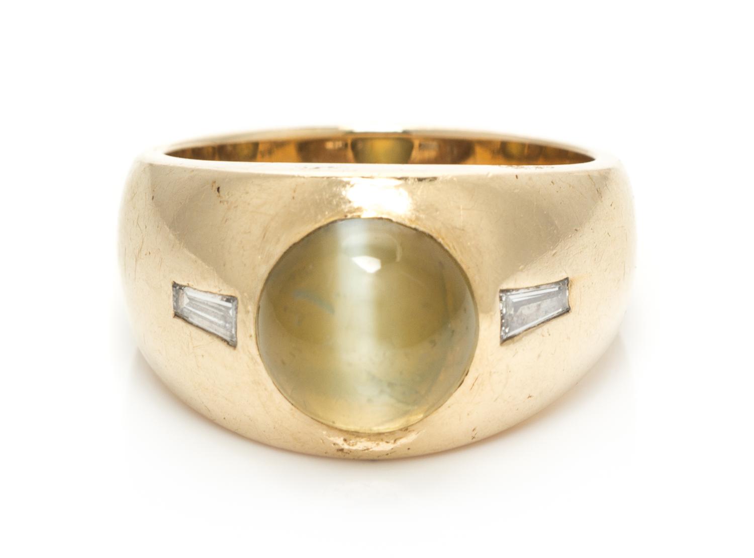 A Yellow Gold Cat's Eye Chrysoberyl and Diamond Ring, 8.60 dwts.