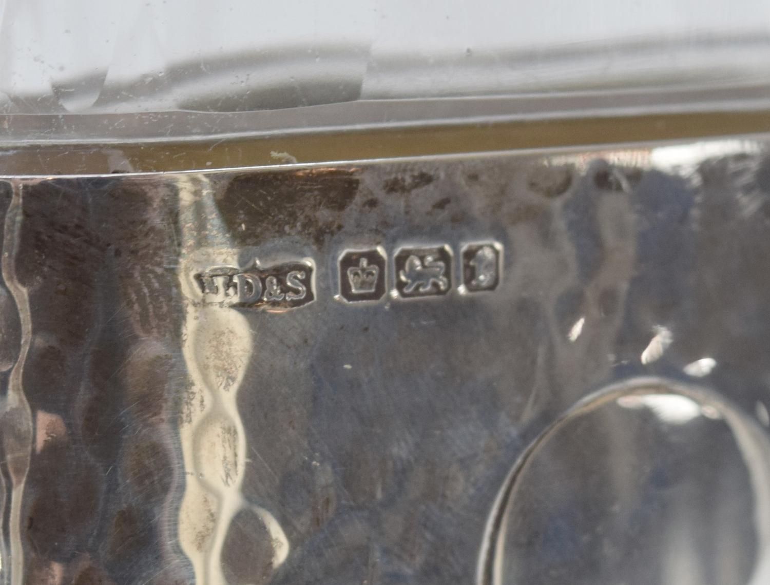 A James Dixon & Sons Hammered Silver and Glass Flask 2.5" W x 1" D x 4.5" H — England, Circa 1911