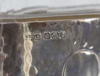 A James Dixon & Sons Hammered Silver and Glass Flask 2.5" W x 1" D x 4.5" H — England, Circa 1911