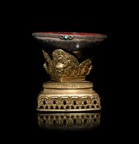 A Tibetan Semi-Precious Stone Inlaid Gilt Bronze and Silver Skull Cup, Kapala