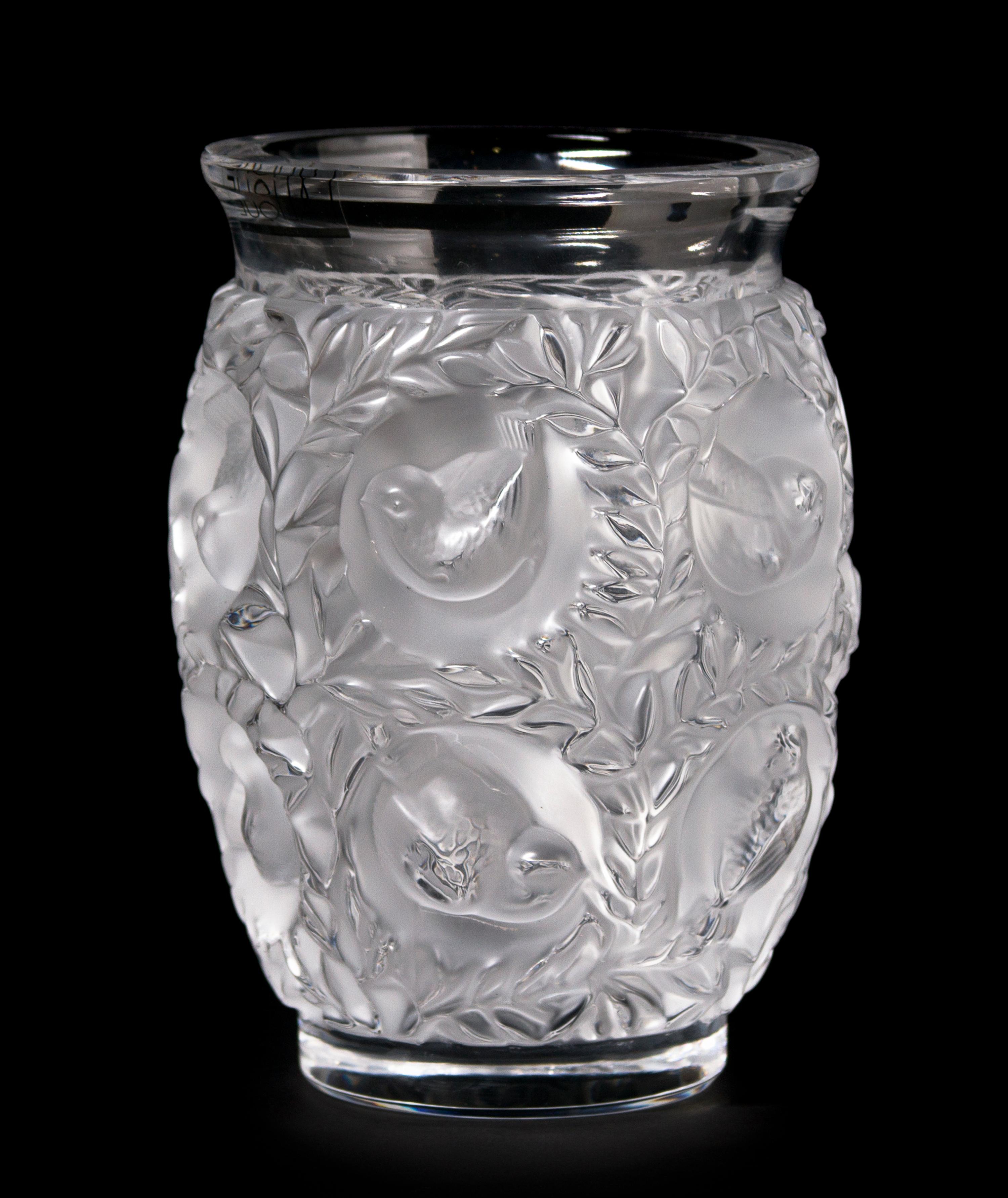 A Lalique Molded and Frosted Glass Vase, Height 6 3/4 inches.