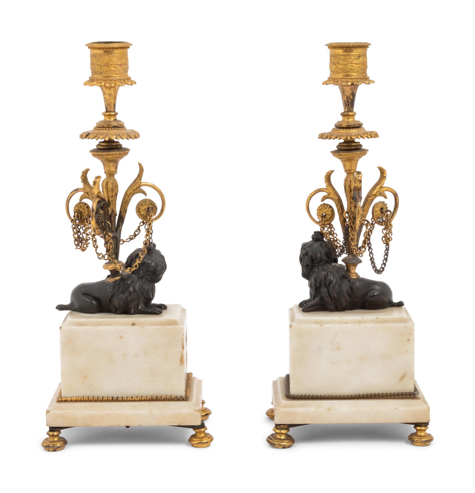 A Pair of Louis Philippe Gilt Bronze and Marble Candlesticks