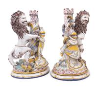 A Pair of French Faience Lion Ornaments