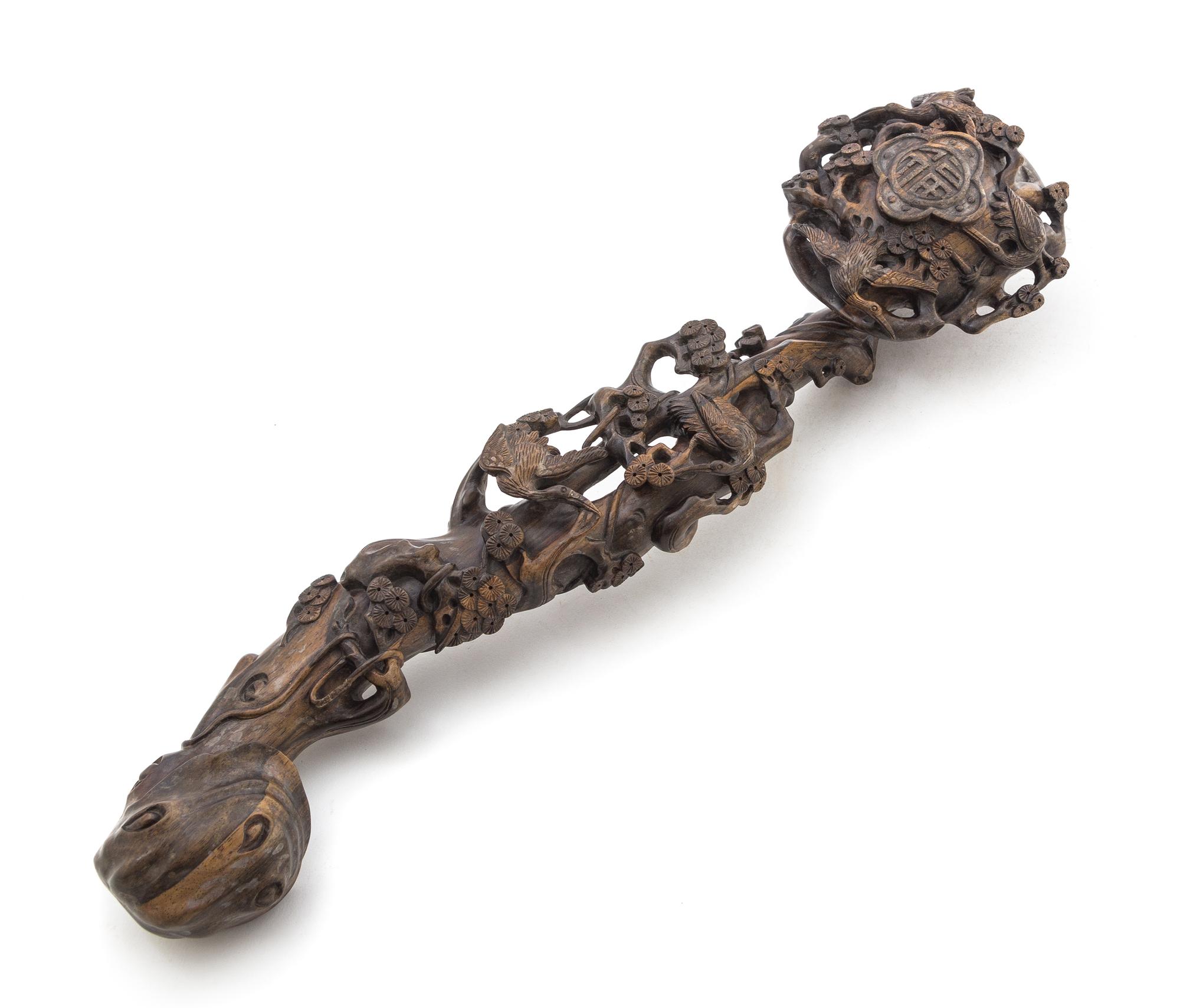 An Aloeswood Ruyi Scepter Length 19 1/4 inches.